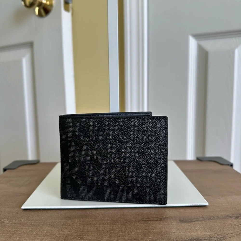 #53. Men's Black Wallet by Michael Kors